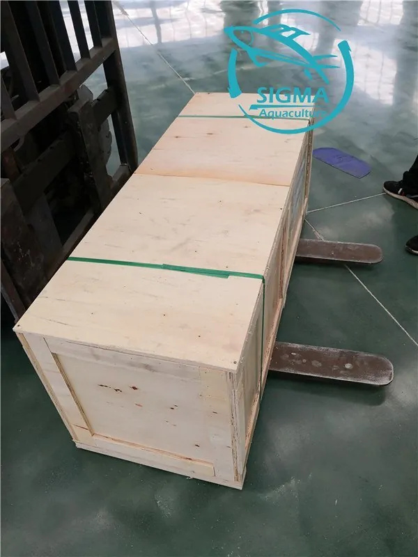 Wooden export crate handled by forklift at the SIGMA factory